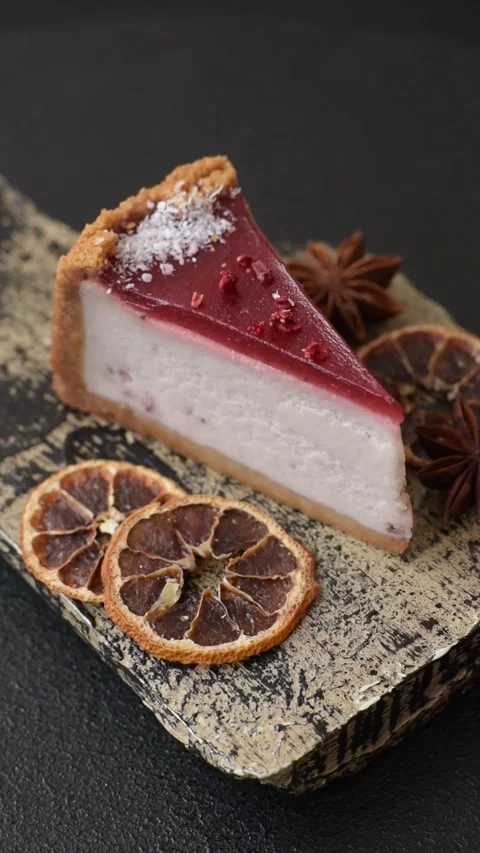 Strawberry cheesecake, a slice of sweet pie, a classic cheesecake dessert. Straw Stock Footage 321416093