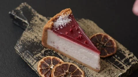 Strawberry cheesecake, a slice of sweet pie, a classic cheesecake dessert. Straw Stock Footage 321416096