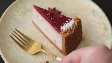 Strawberry cheesecake, a slice of sweet pie, a classic cheesecake dessert. Straw Stock Footage 321416110