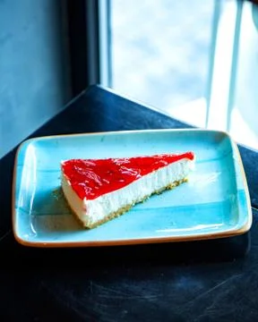 Strawberry cheesecake on the table Stock Photos