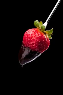 Strawberry with chocolate dip Stock Photos