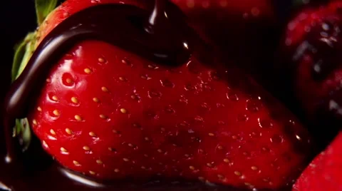 Strawberry in chocolate in slow motion Stock Footage 54643334