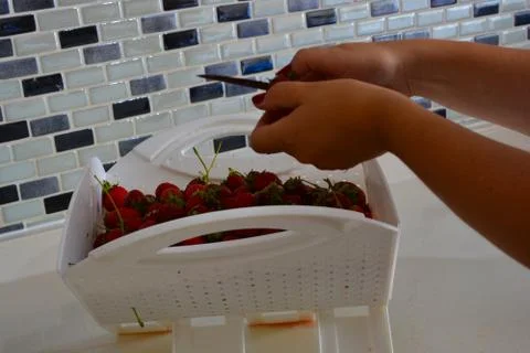Strawberry cleaning Stock Photos