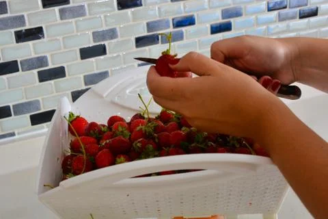 Strawberry cleaning Stock Photos