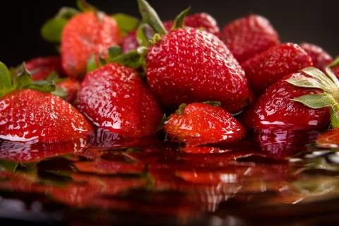 Strawberry closeup in water Stock Photos