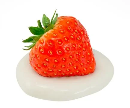 Strawberry on cream Stock Photos
