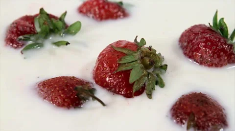 Strawberry in cream rotate clockwise Stock Footage 61218517