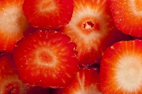 Strawberry cut by segments Stock Photos