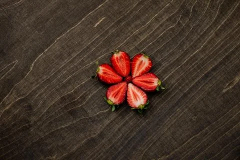 Strawberry on a dark wood background. Creative pattern concept. - Image 스톡 사진