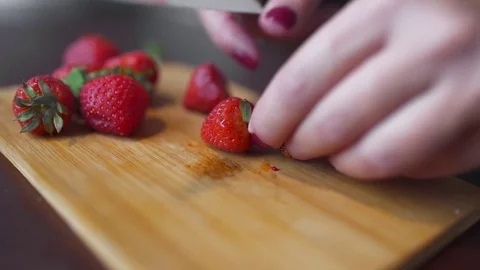 Strawberry for decorating the baking, the cook slices strawberries, fresh Stock Footage 71292475