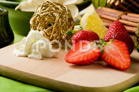 Strawberry dessert on cutting board Stock Photos