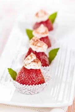 Strawberry dessert with mint. Stock Photos