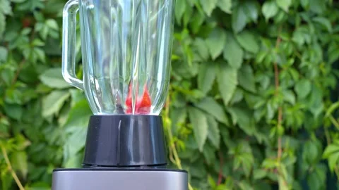 Strawberry falling down in the blender Stock Footage 138000039