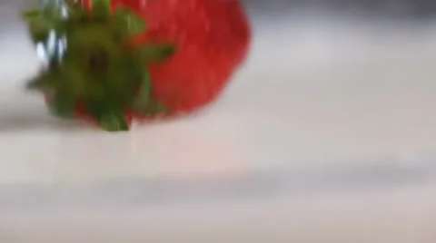 Strawberry falls into milk Video stock 62586970