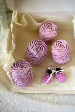 Strawberry, grape and raspberry marshmallows in a gift box for kids. Stock Photos