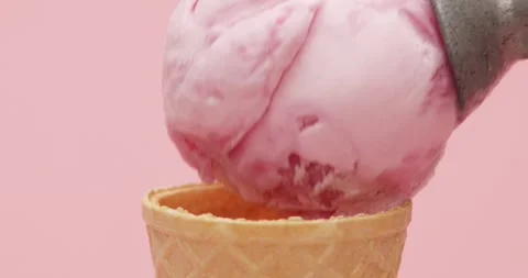Strawberry Ice Cream on a cone Stock Footage 165723058
