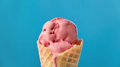 A scoop of pink ice cream in a specializ, Stock Video