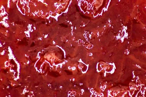 Strawberry jam background. macro Stock Photos