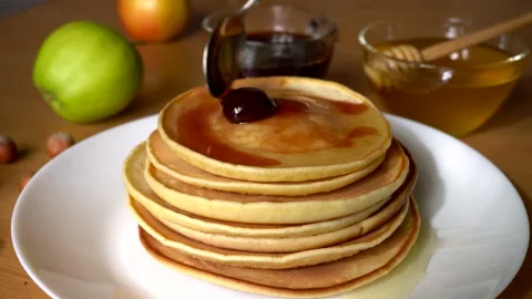 Strawberry jam pouring on pancakes stack Stock Footage 162778073