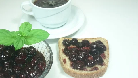 Strawberry Jam On Whole Wheat Bread For Breakfast, 4K Stock Footage 92138026