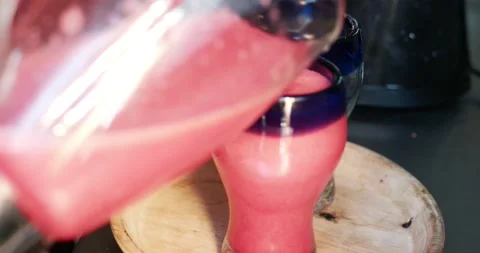 Strawberry juice, close up 4k Video stock 140282941