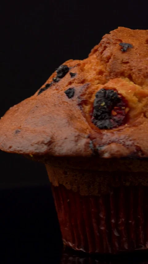Strawberry Lemon Muffin on Dark Background Under Studio Lights Stock Footage 330517427