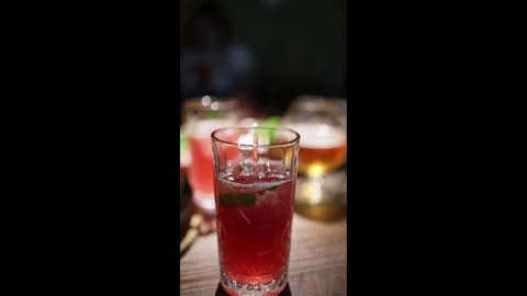 Strawberry lemonade refreshing summer beverage in cafe, cold fruit drink Stock Footage 344744829
