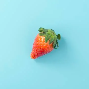 Strawberry on light blue background, flat lay Stock Photos