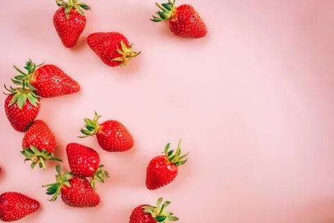 Strawberry on the light pink background. Stock Photos