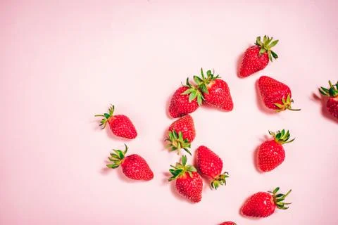 Strawberry on the light pink background. Stock Photos