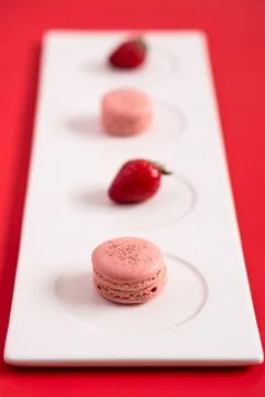 Strawberry macarons Stock Photos
