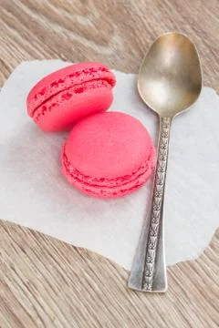 Strawberry  macaroons with spoon Stock Photos