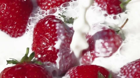 Strawberry in milk. Slow motion Stock Footage 219742503