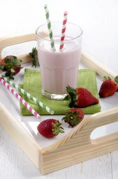 Strawberry milkshake on a serving tray Stock Photos