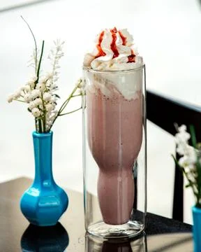 Strawberry milkshake on the table Stock Photos