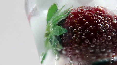 Strawberry mojito cocktail rotation Stock Footage 24877089