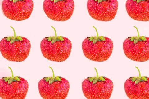 Strawberry pattern on pastel pink background, minimal concept Stock Photos