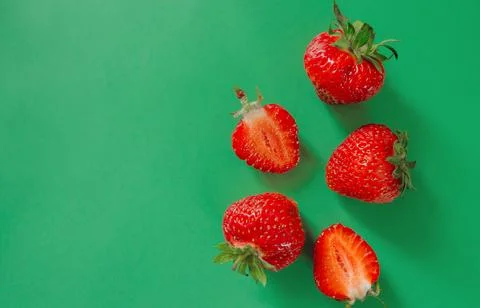 Strawberry. Pattern of strawberrys on colored background. Stock Photos