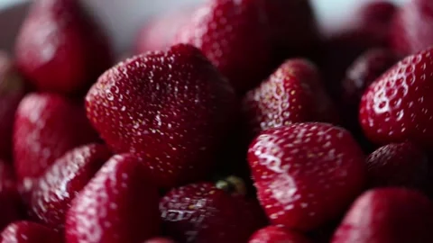 Strawberry pile spinning on the table Stock Footage 199936315