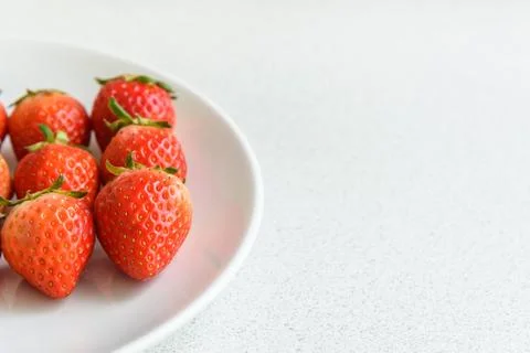 Strawberry on the plate, selective focus Stock Photos