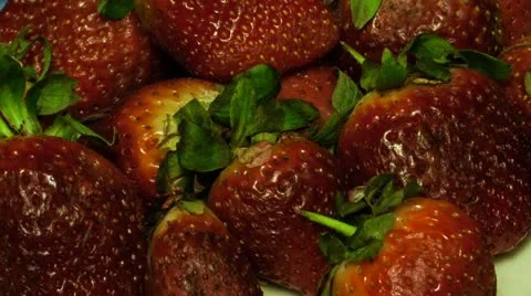 Strawberry: Plate of strawberries time lapse - top view close up Stock Footage