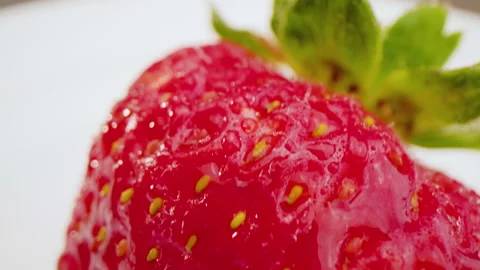 Strawberry on Plate Tilting Down Side Focus Macro Stock Footage 156056841