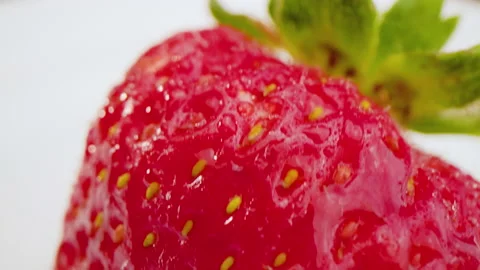 Strawberry on Plate Tilting Up Macro Stock Footage 156056796