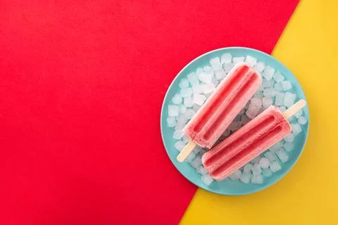 Strawberry popsicles with ice Stock Photos