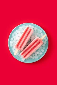 Strawberry popsicles with ice Stock Photos
