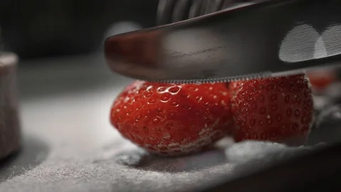 Strawberry in powder, cut into two halves. Close up appetizing food shooting Stock Footage 125364727