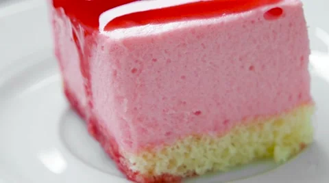 Strawberry pudding with jam on top closeup Stock Footage 54227288