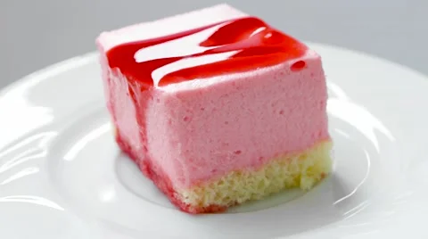 Strawberry pudding with jam on top, rotates on plate Vídeos de archivo 54227103