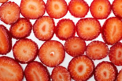 Strawberry red slice on white. Texture of a strawberrys surface. Strawberri.. Stock Photos