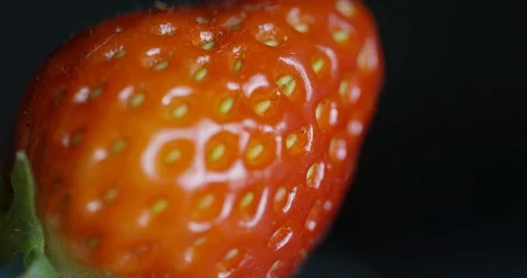 Strawberry Rotating In Front Of Camera On Black Background Close Up  Stock Footage 114054925